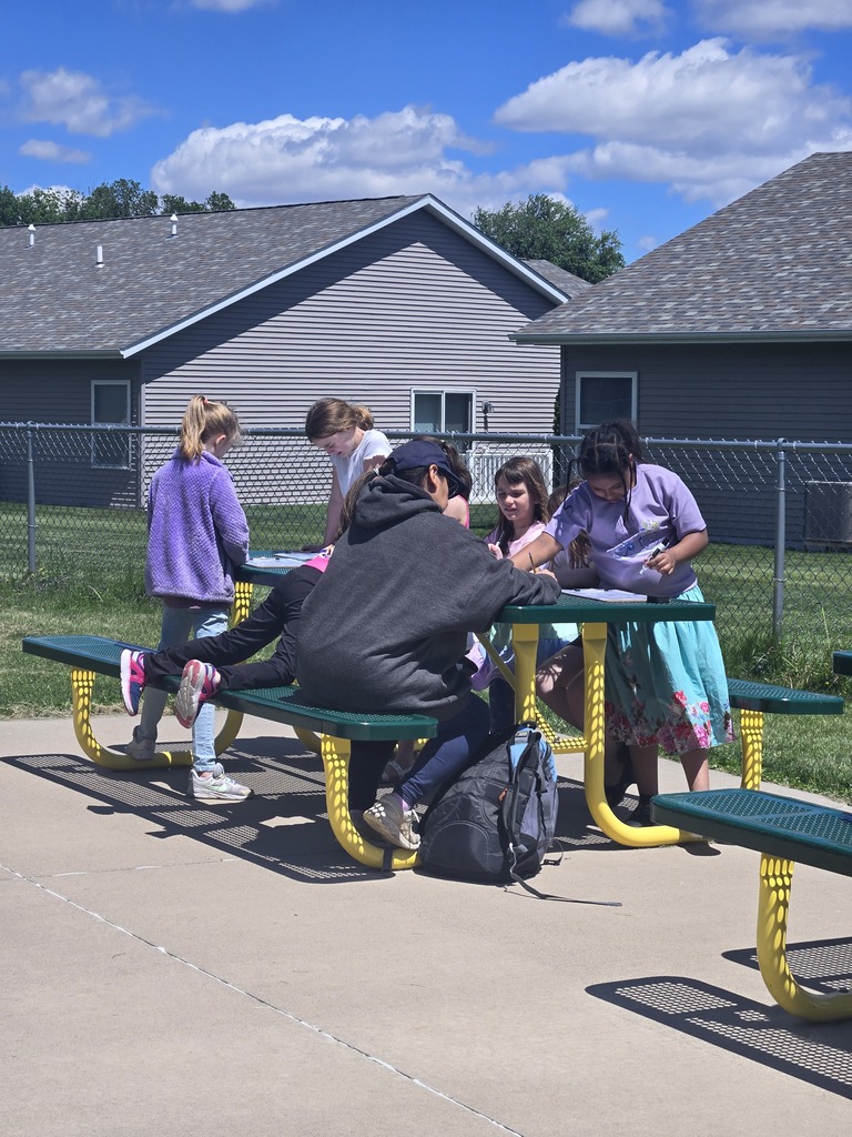 Students playing Phonics bingo outside!