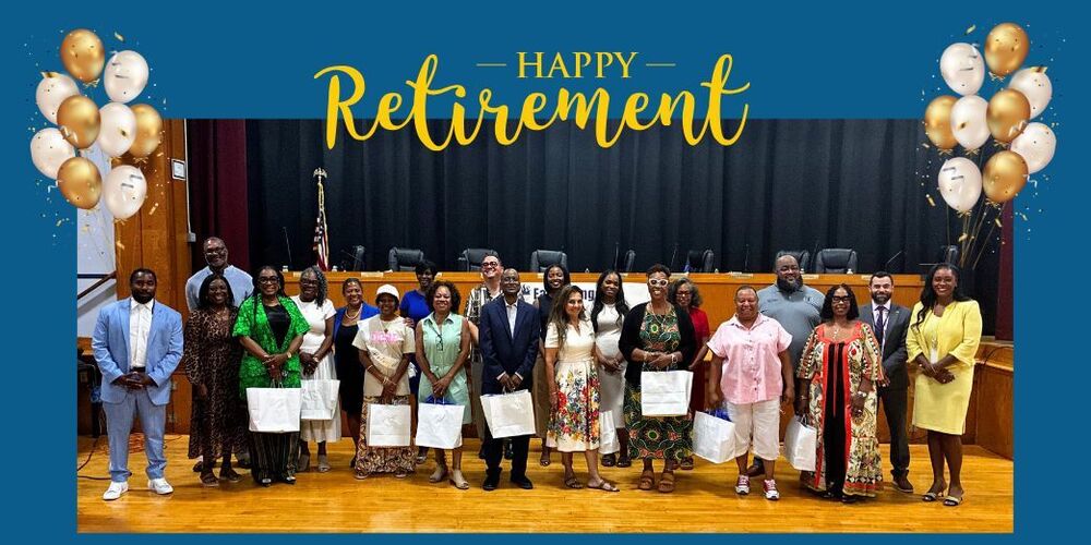 Happy Retirement picture of our retirees with district leaders and Board members