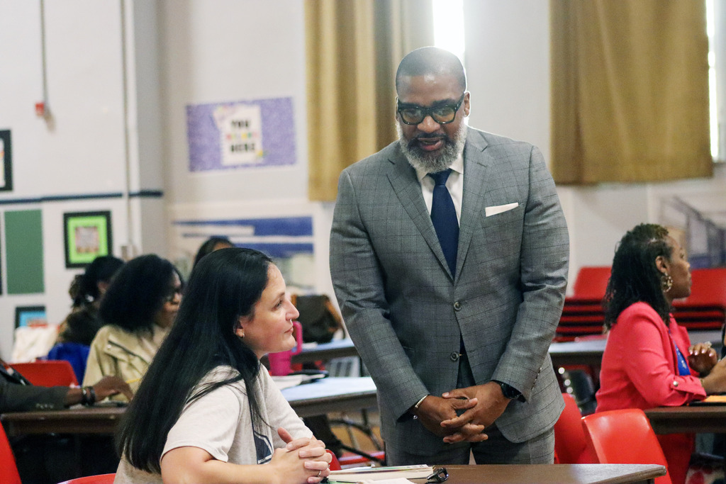 Dr.Taylor speaking with staff