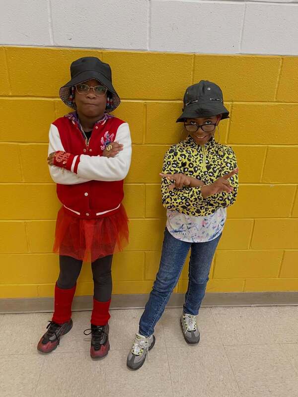 2 students dressed up for 90s theme