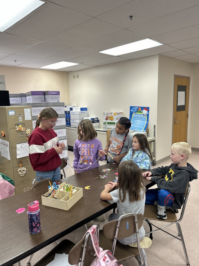 students with teacher crafting