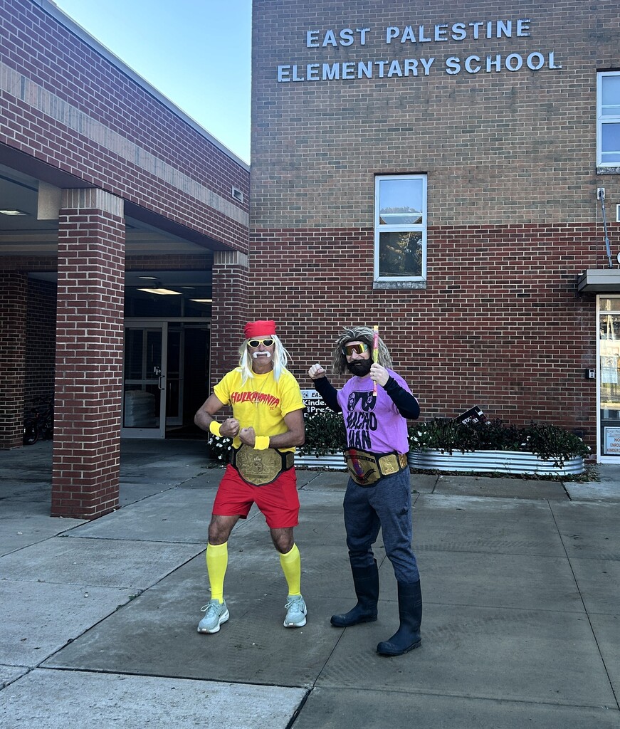 principal clunen and mr geiss in their halloween costumes