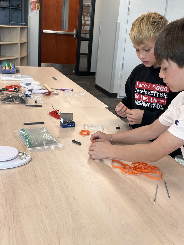 A group of students together to test materials