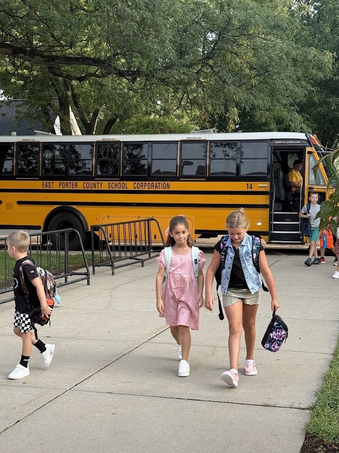 Students getting off bus