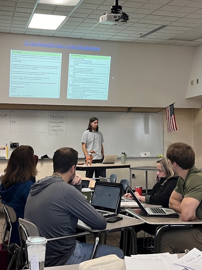 Teachers listening to presenter