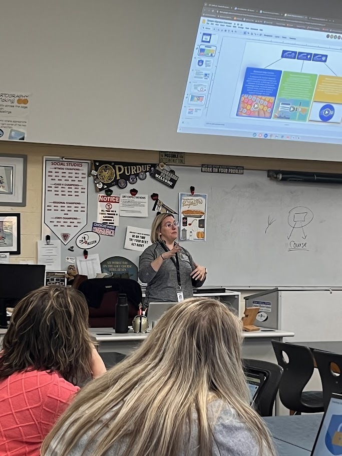 Teachers listening to presenter