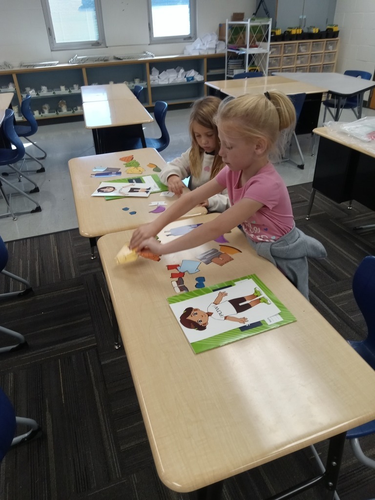 Elementary children doing a STEM activity