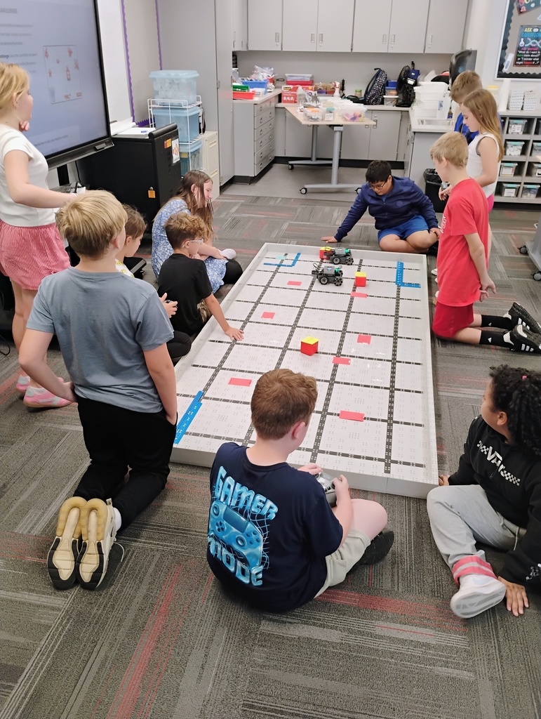 Elementary children doing a STEM activity