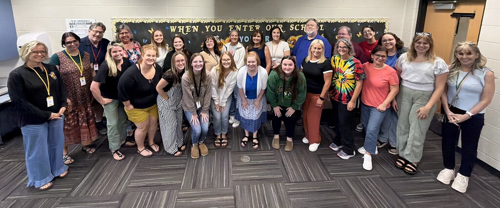Group photo of new teachers and their mentors