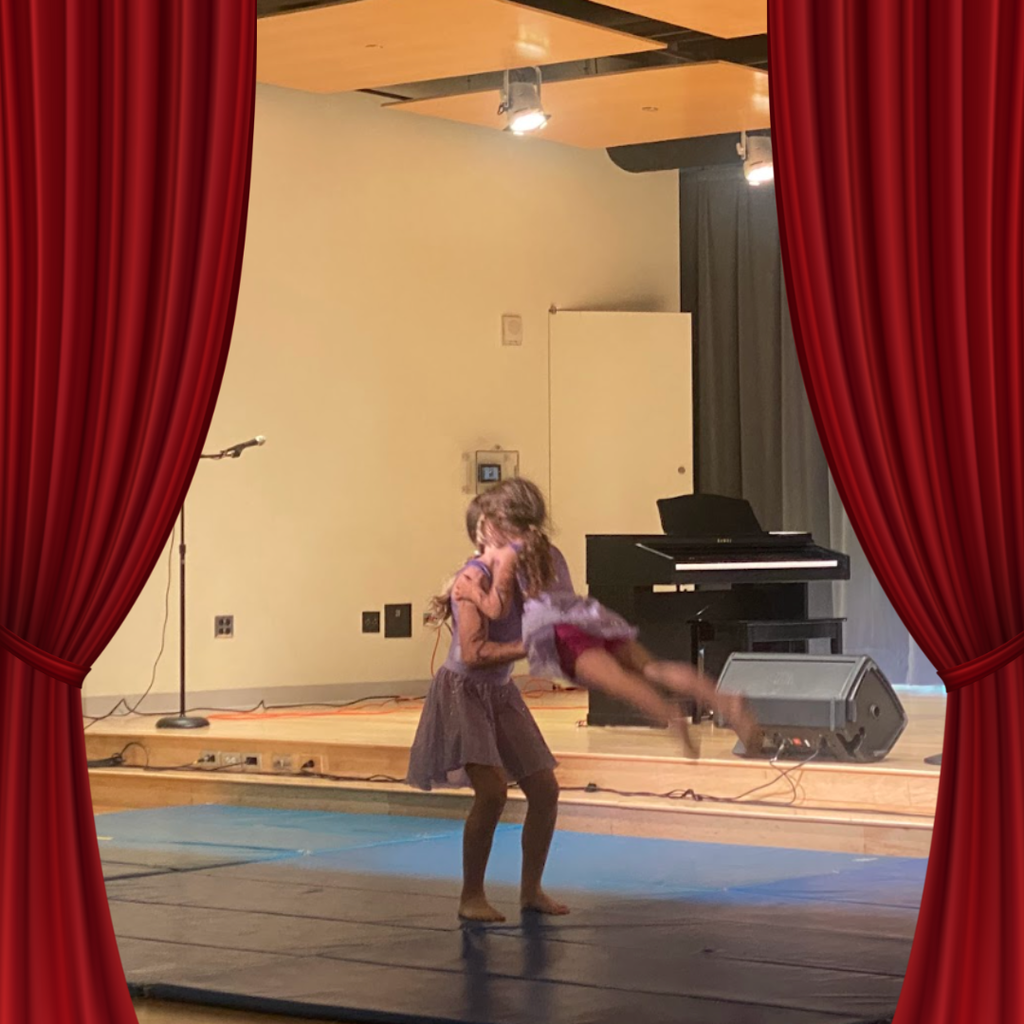 students on stage for talent show