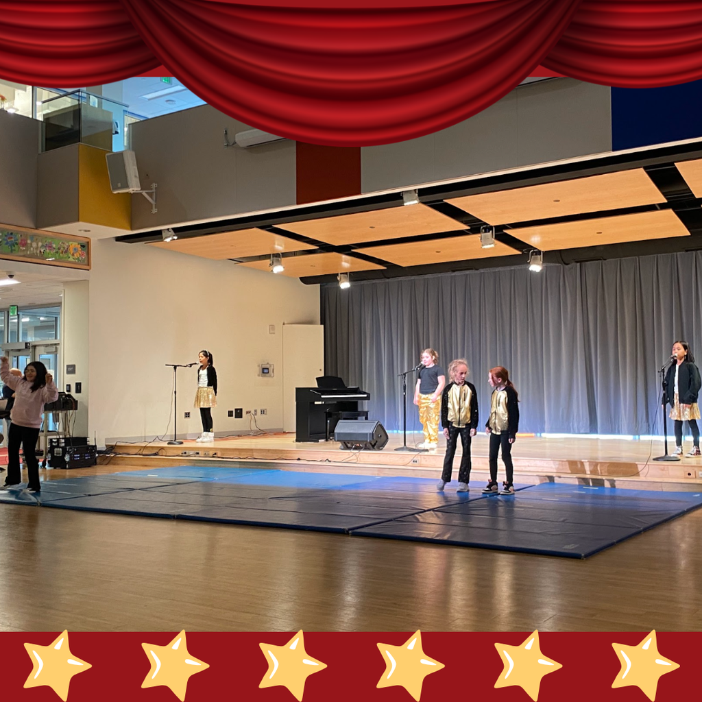 students on stage for talent show