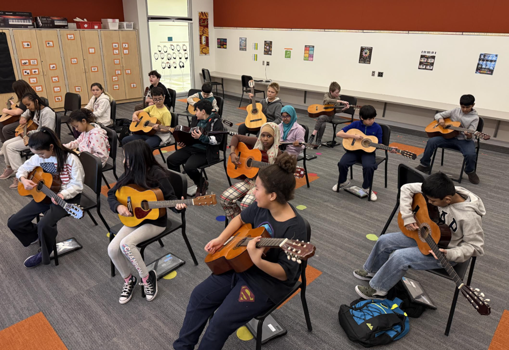 picture of kids playing instruments 