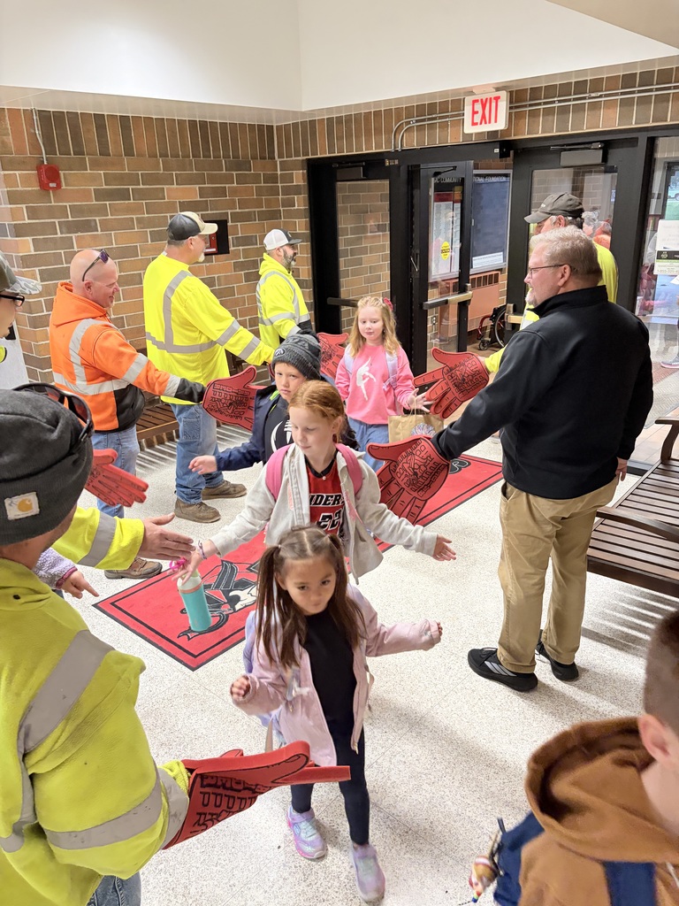 city of sac city greeting students high five friday