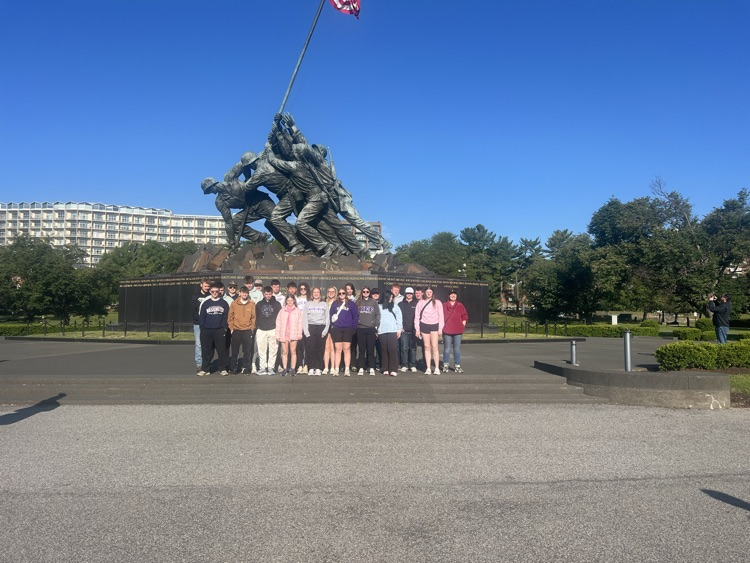students standing in front of the Marine Corps memorial in Arlington