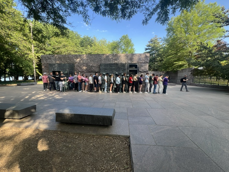 students standing in the soup kitchen line at the FDR memorial