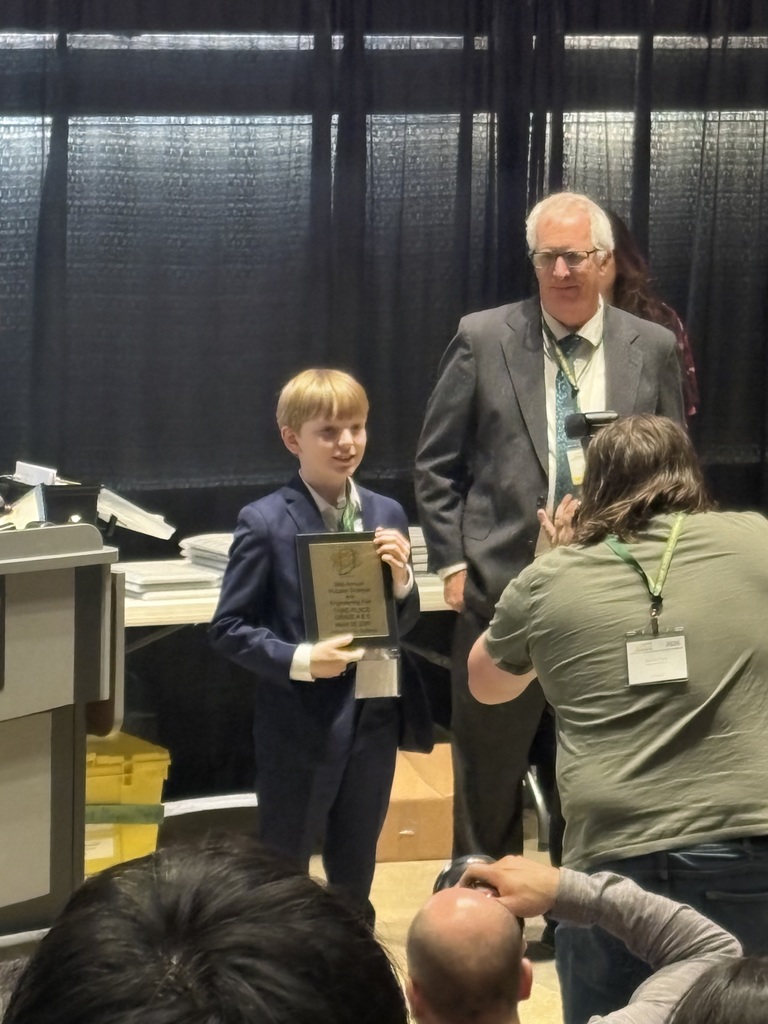 Colton Champers accepting award