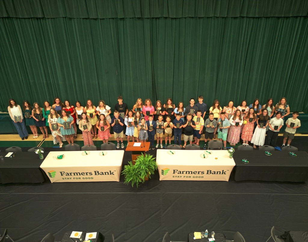 All Eastern Academic Banquet Students after the banquet with their awards near the stage. 