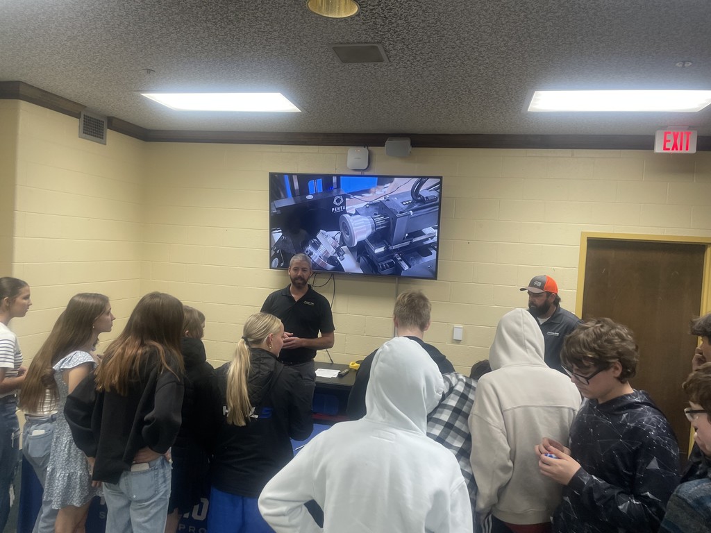 man giving presentation to students