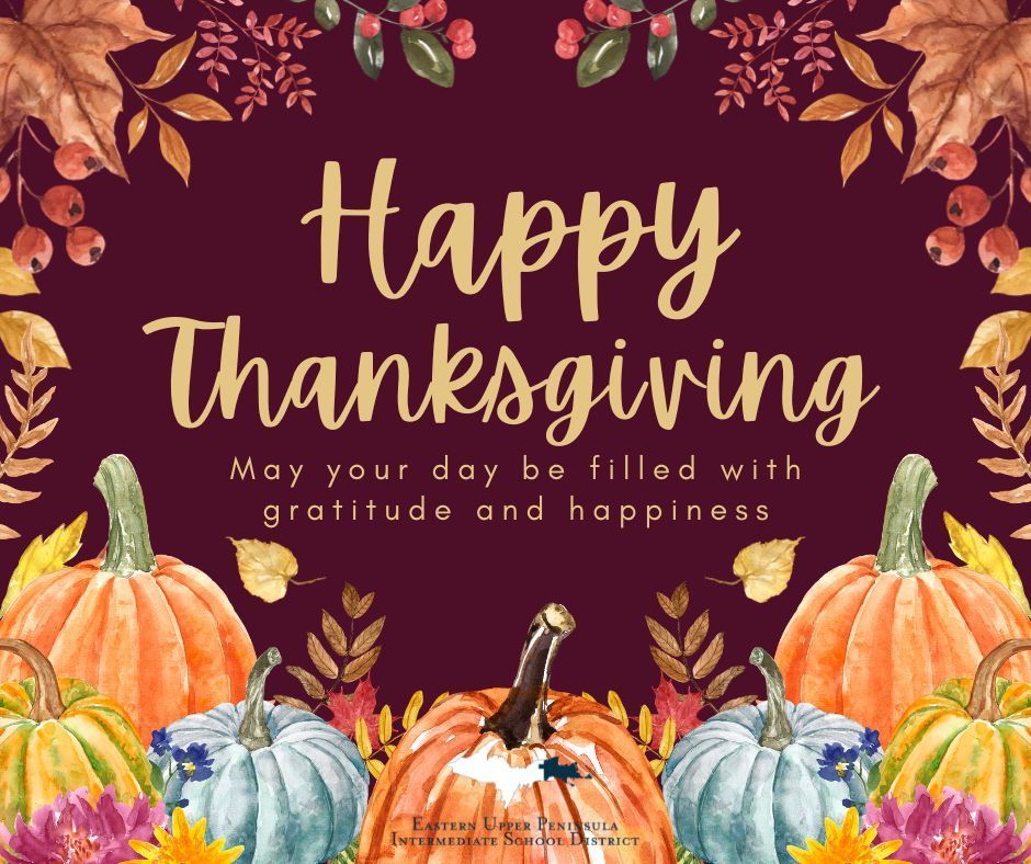 A graphic of deep colors - Autumn leaves frame the edge of the top half and the bottom half has a blend of orange and green pumpkins and dark pink, gold and deep purple flowers. Text says "Happy Thanksgiving. May your day be filled with gratitude and happiness."