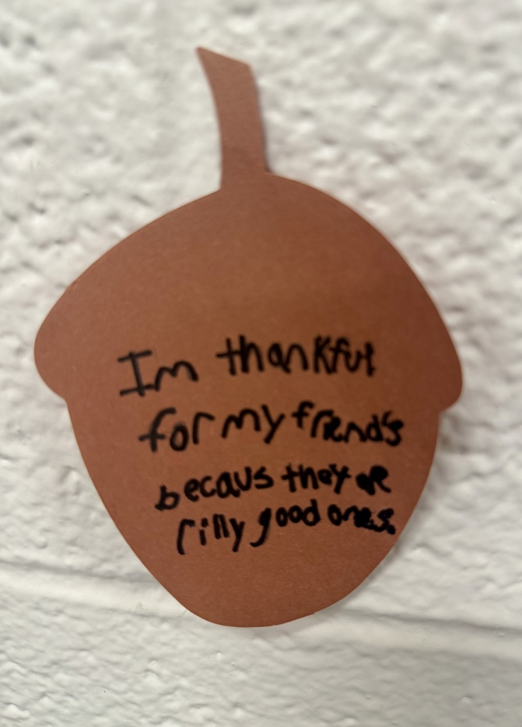 A brown construction paper acorn reads "Im thankful for my friends because they are rilly good ones."