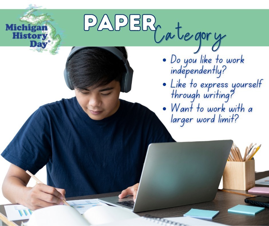 A student wearing headphones writes on paper while using an open laptop on a desk. The top banner includes the Michigan History Day logo and the text “Paper Category.” A white text area lists questions: “Do you like to work independently? Like to express yourself through writing? Want to work with a larger word limit?”