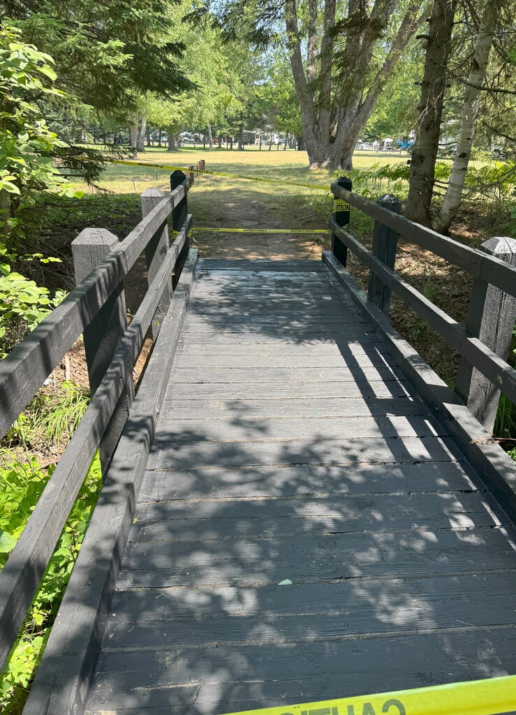 A freshly painted wooden bridge.
