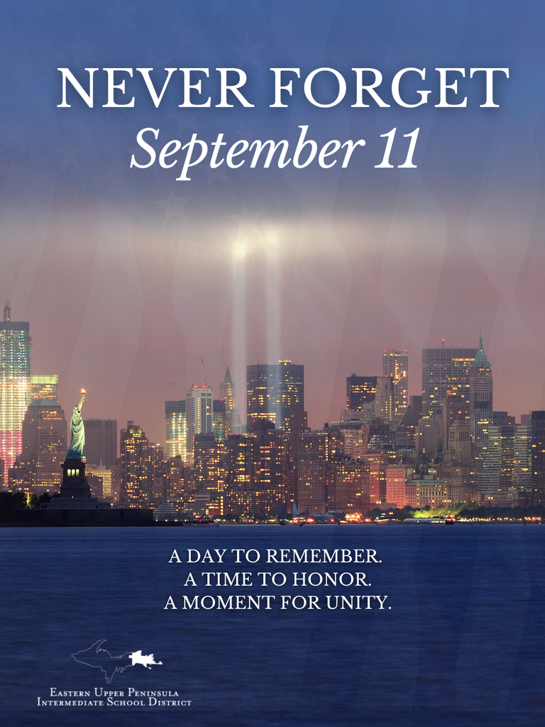 Graphic featuring the New York City skyline at dusk with the Statue of Liberty in the foreground and the Tribute in Light memorial beams shining into the sky. A subtle American flag overlays the background. Large text reads, “NEVER FORGET September 11.” Additional text states, “A DAY TO REMEMBER. A TIME TO HONOR. A MOMENT FOR UNITY.” The Eastern Upper Peninsula Intermediate School District logo appears at the bottom of the image.