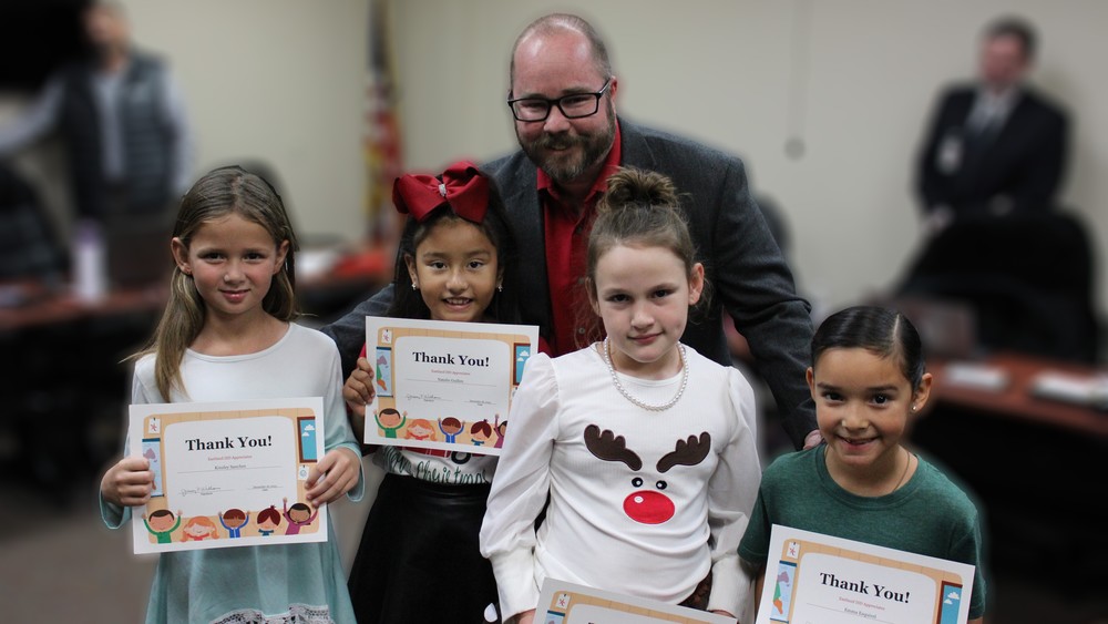 Kassie, Natalie, Kinzley, and Emma Lead Pledge