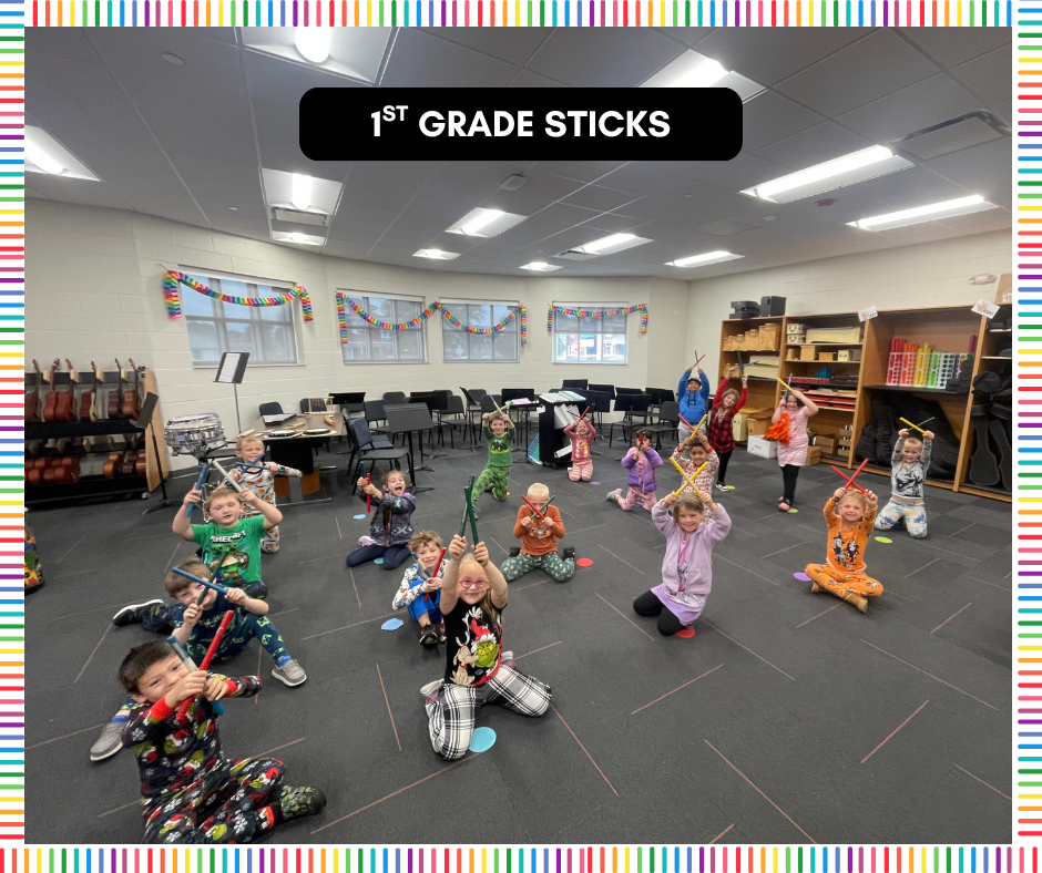 1st grade has rhythm sticks in this picture. 