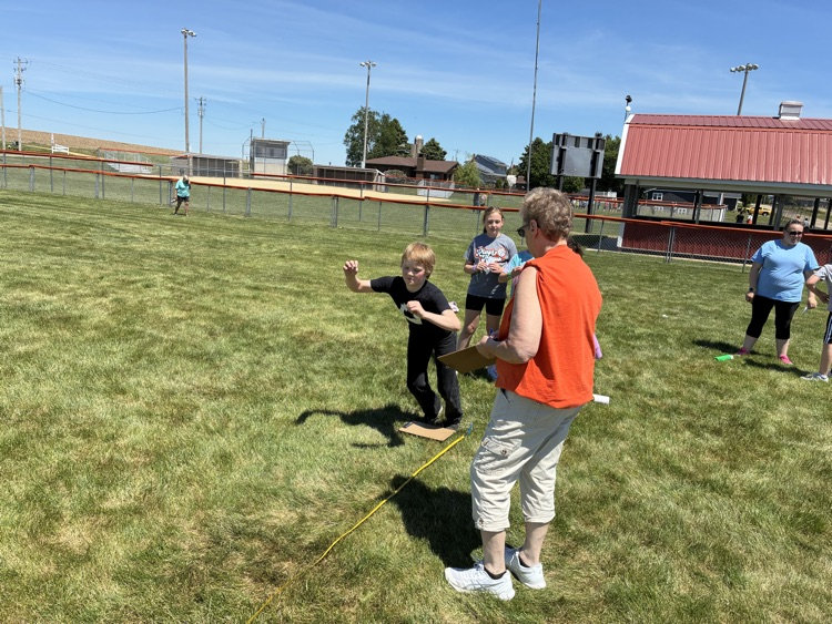 Students participating in the standing long jump