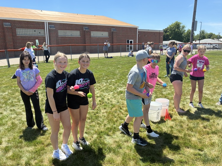 students participating in the water balloon race 