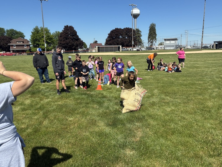 students participating in the potato sack race 