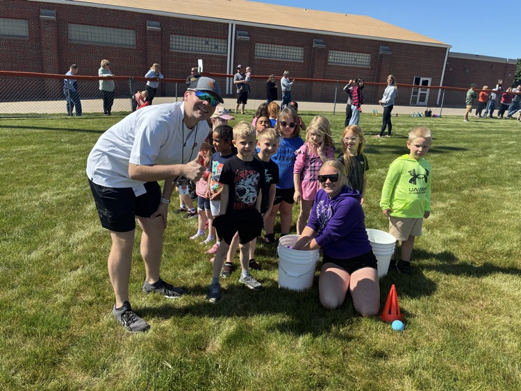 students getting ready to participate in the water balloon race