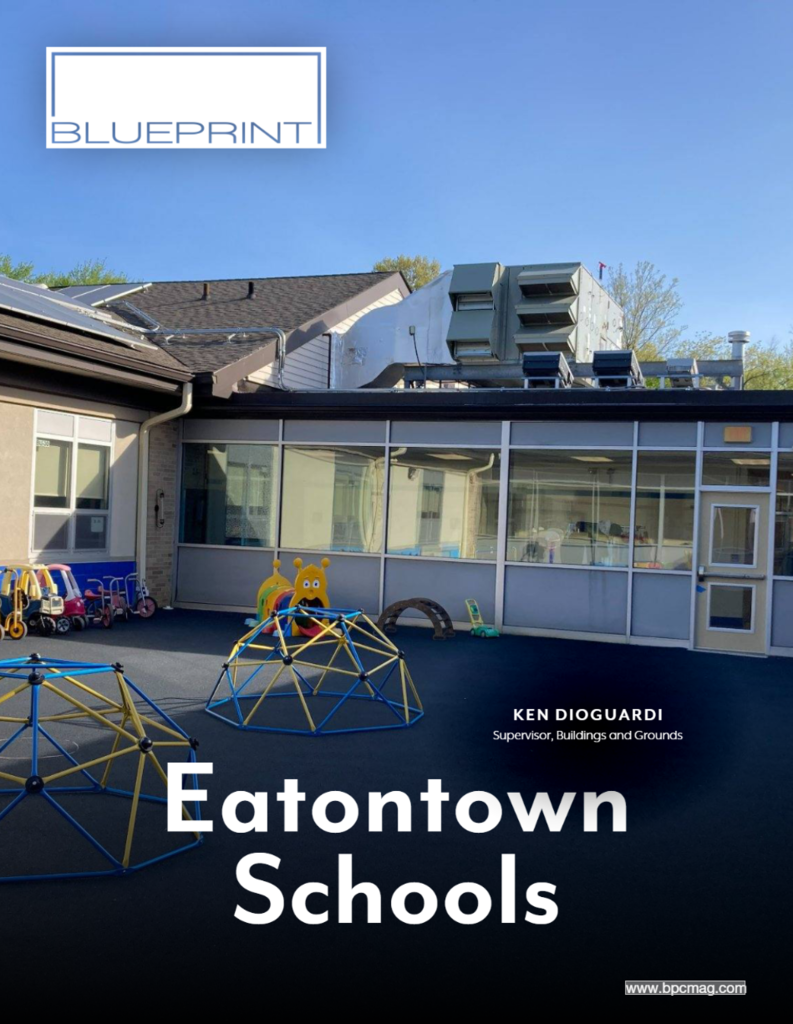 Blueprint Magazine Cover featuring Eatontown Schools' Supervisor of Buildings & Grounds, Ken Dioguardi including a photo of the new playground with a blue rubberized ground and playground equipment.