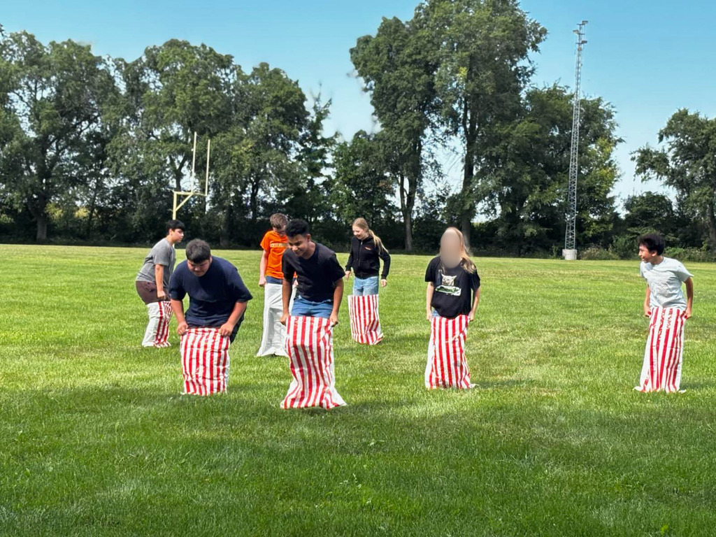 Students playing sack race.