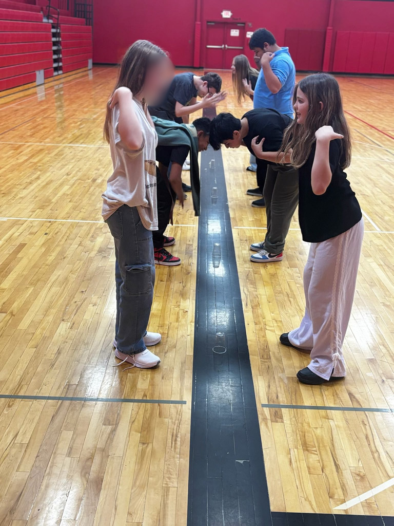 Students playing Cup Grab