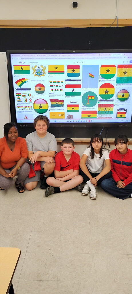 Students with Ghanaian flag