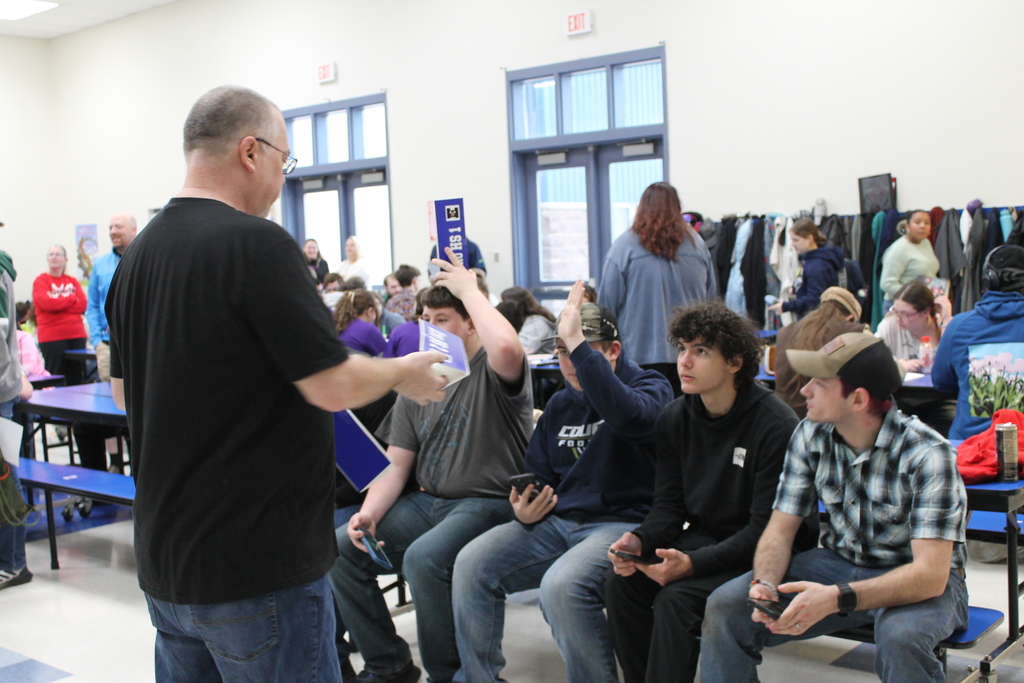 Mr. Cox addresses a Knowledge Bowl Team