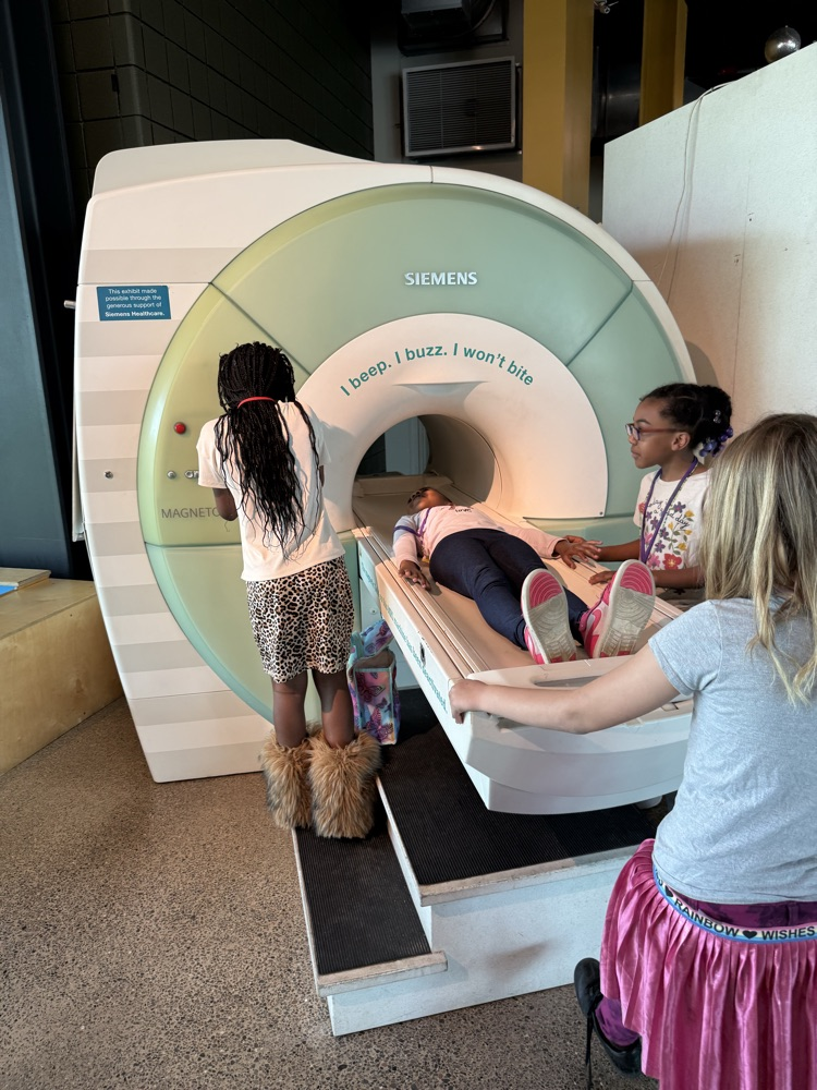 kids exploring Detroit science center