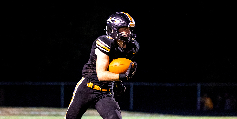 Zane Mollenix Running the Ball Down Field
