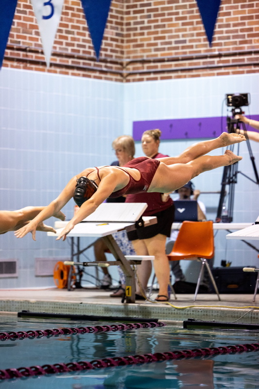 Morrison Diving Into the Water at the Start of Her Race