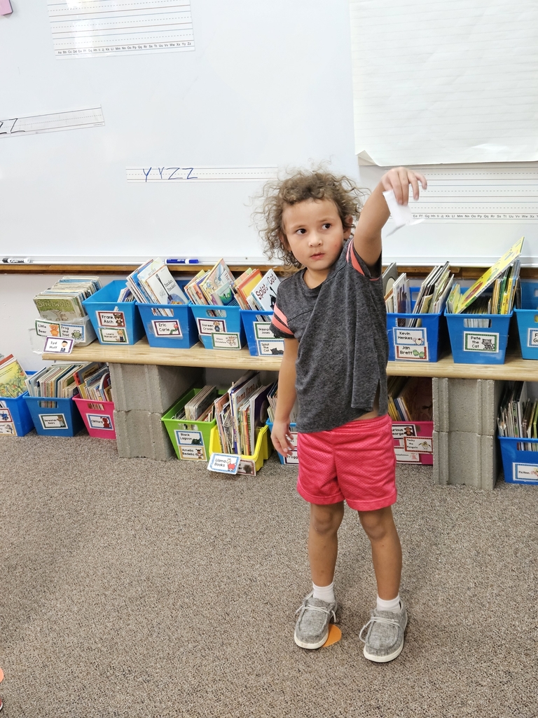 a girl dropping paper seeds