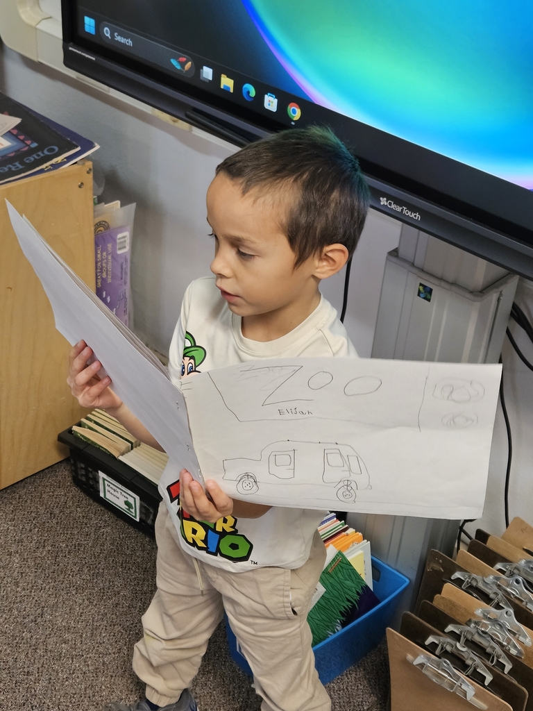 a boy reading a book