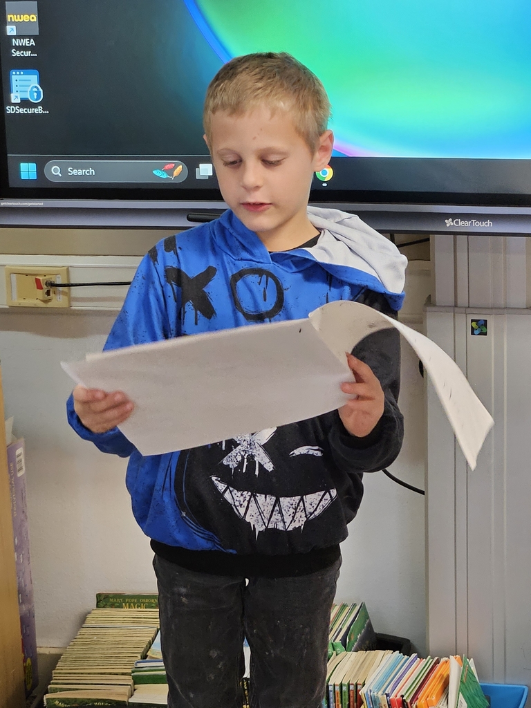 a boy reading a book