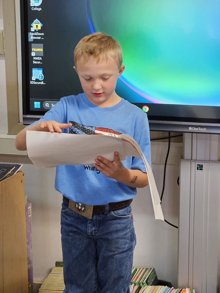 a boy reading a book