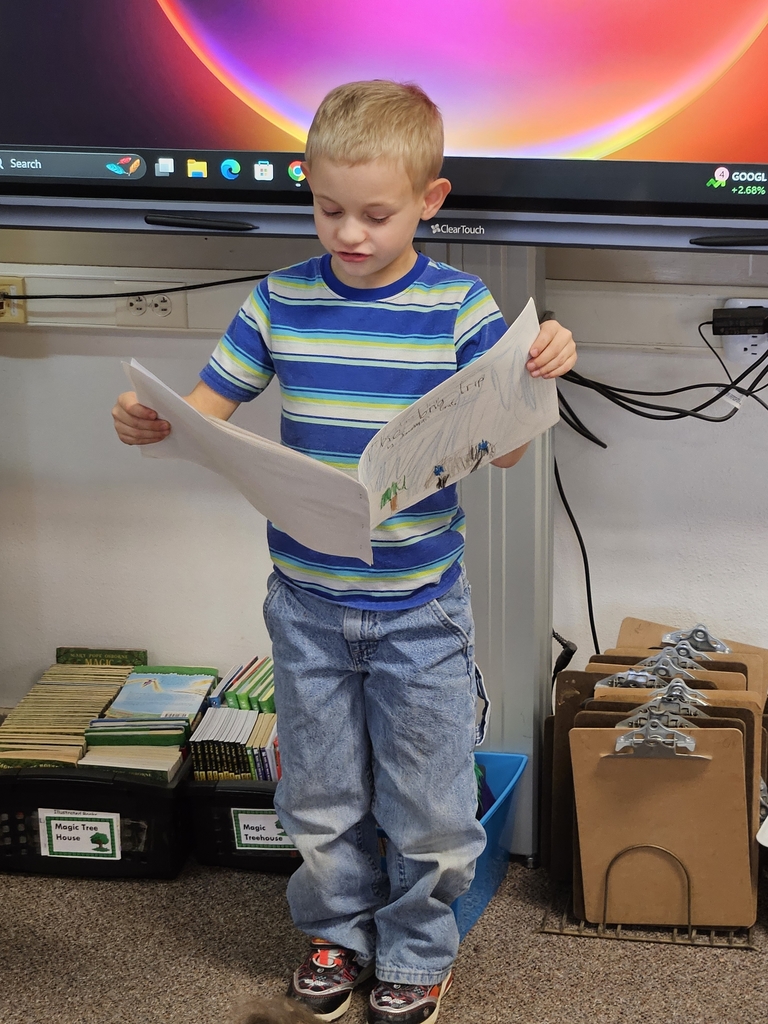 a boy reading a book