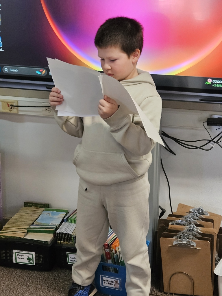 a boy reading a book