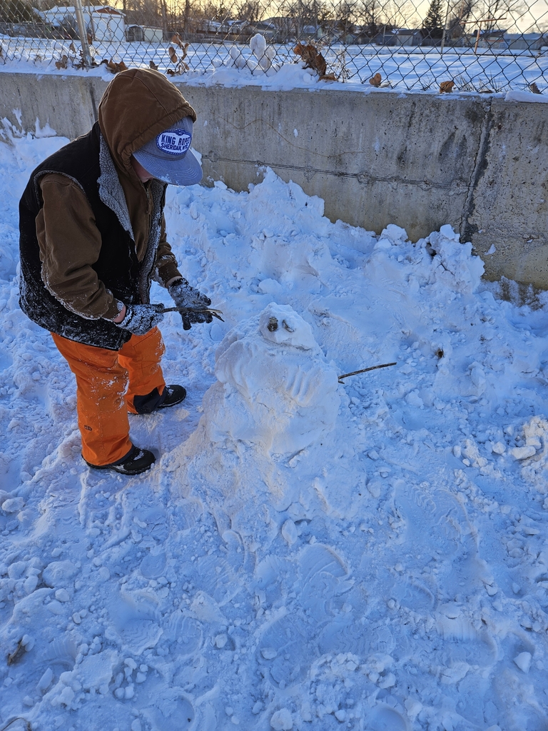 boy with snowman 