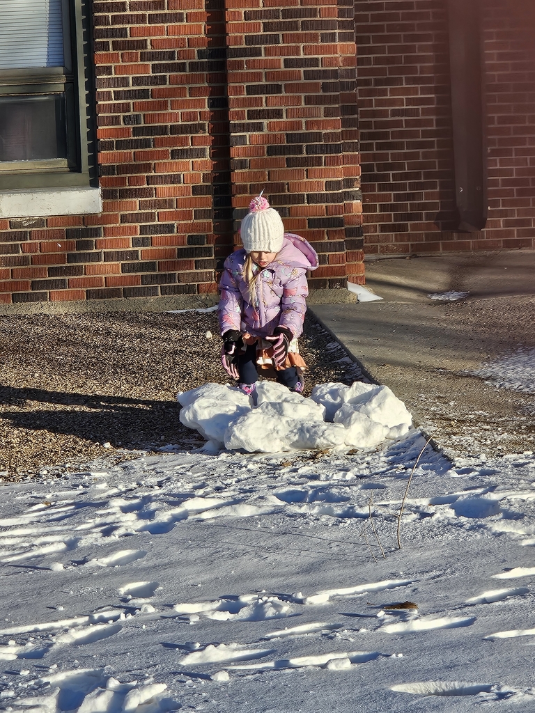 girl with snow pile