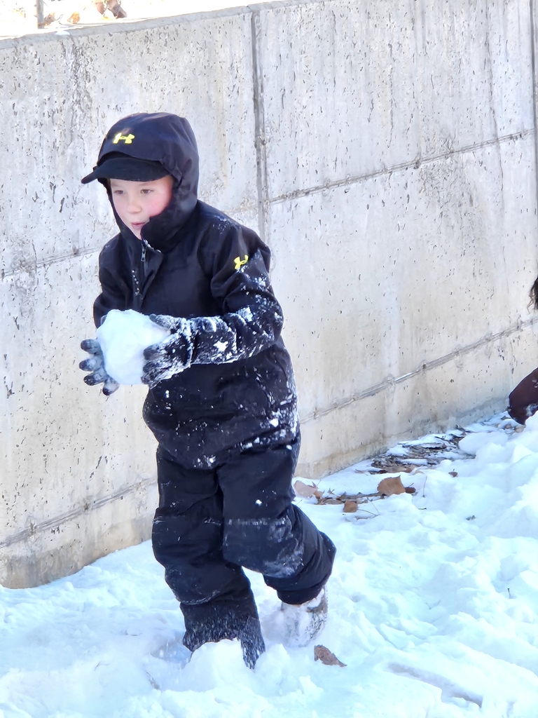 boy with snowball 